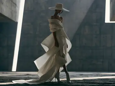 A couture gown shot against concrete